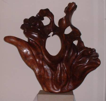 Teaching sculpture gives a wonderful feeling.  My aim is to hope that my students enjoy sculpture as much as I do.  I enjoy the flowing forms that can be found in wood and stone.